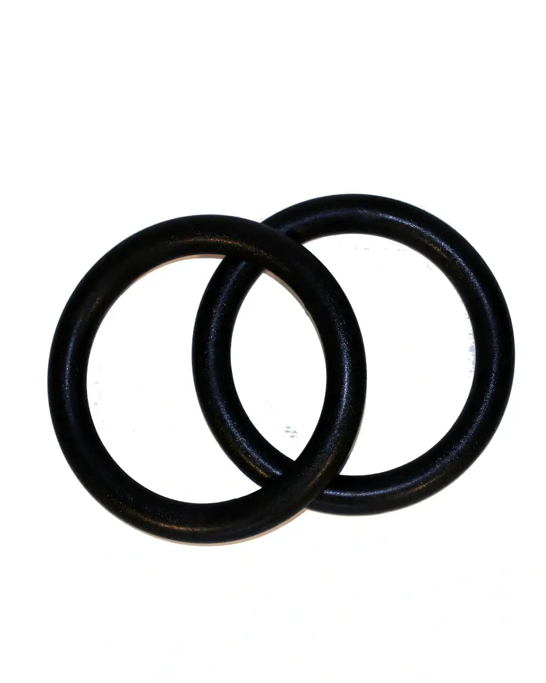 Two black rubber gym rings with a smooth textured surface for home fitness use in a pair set