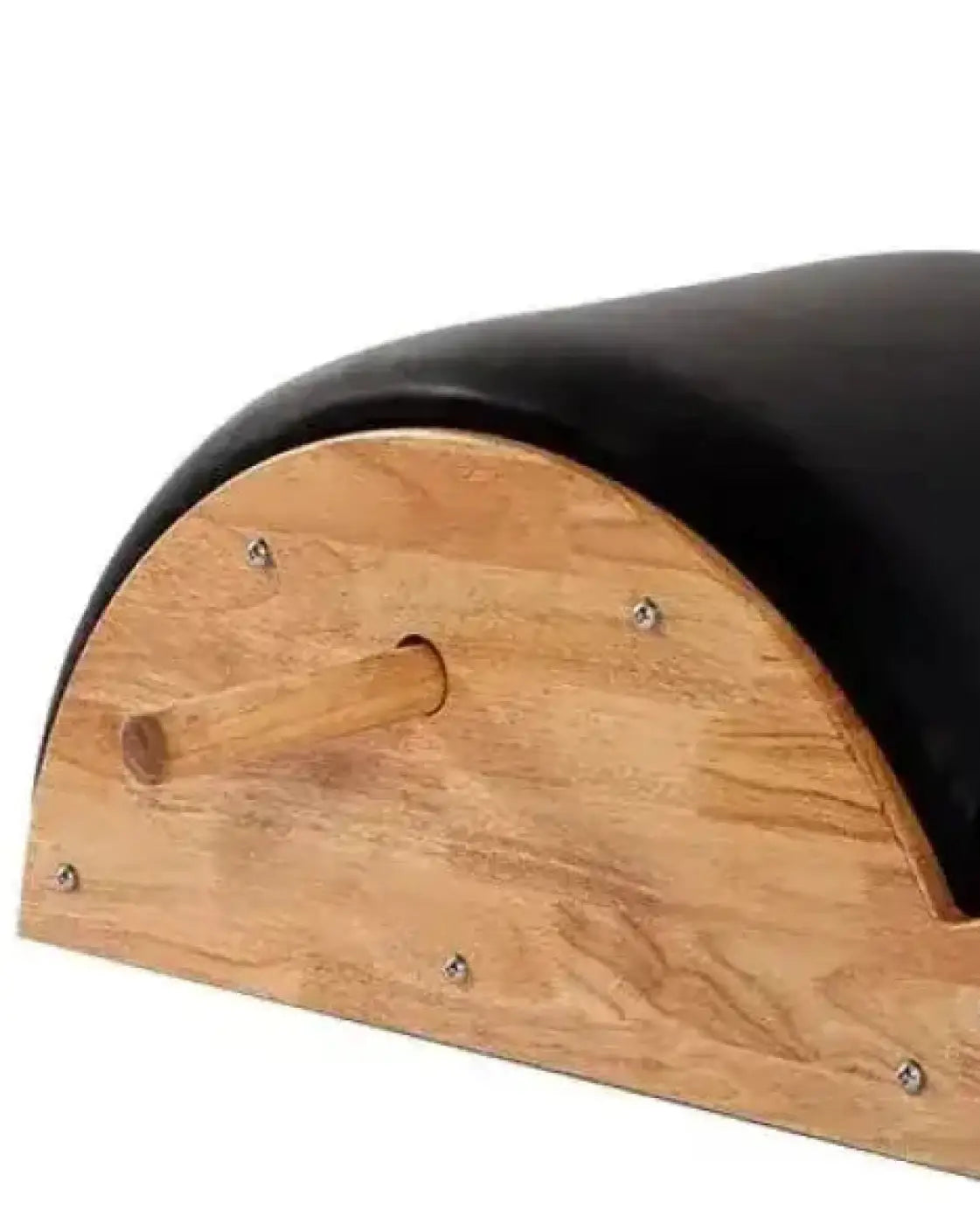 Black leather-covered wooden pilates reformer base with natural wood grain finish and metal screws for spine corrector