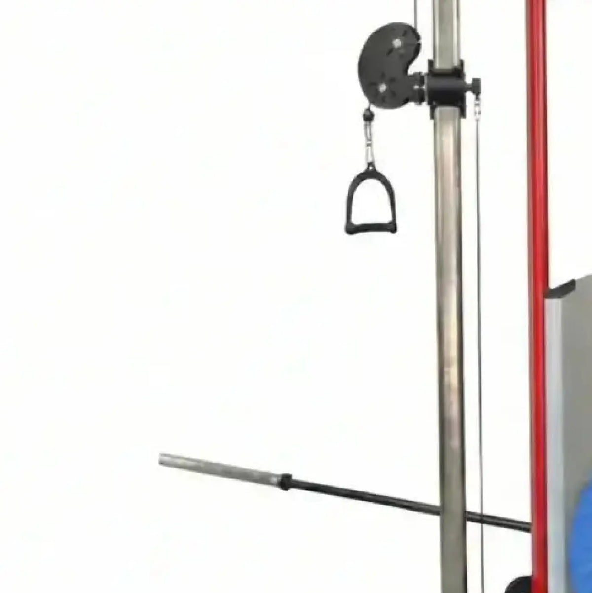 Black metal foot strap attached to cable pulley system on Spartan Studio Rig home fitness gym machine
