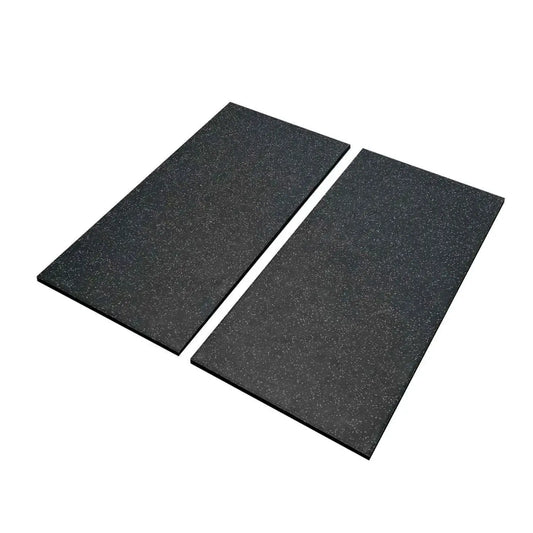 Two dark grey fleck 20mm premium black rubber tiles with speckled texture for home gyms measuring 1m by 0.5m