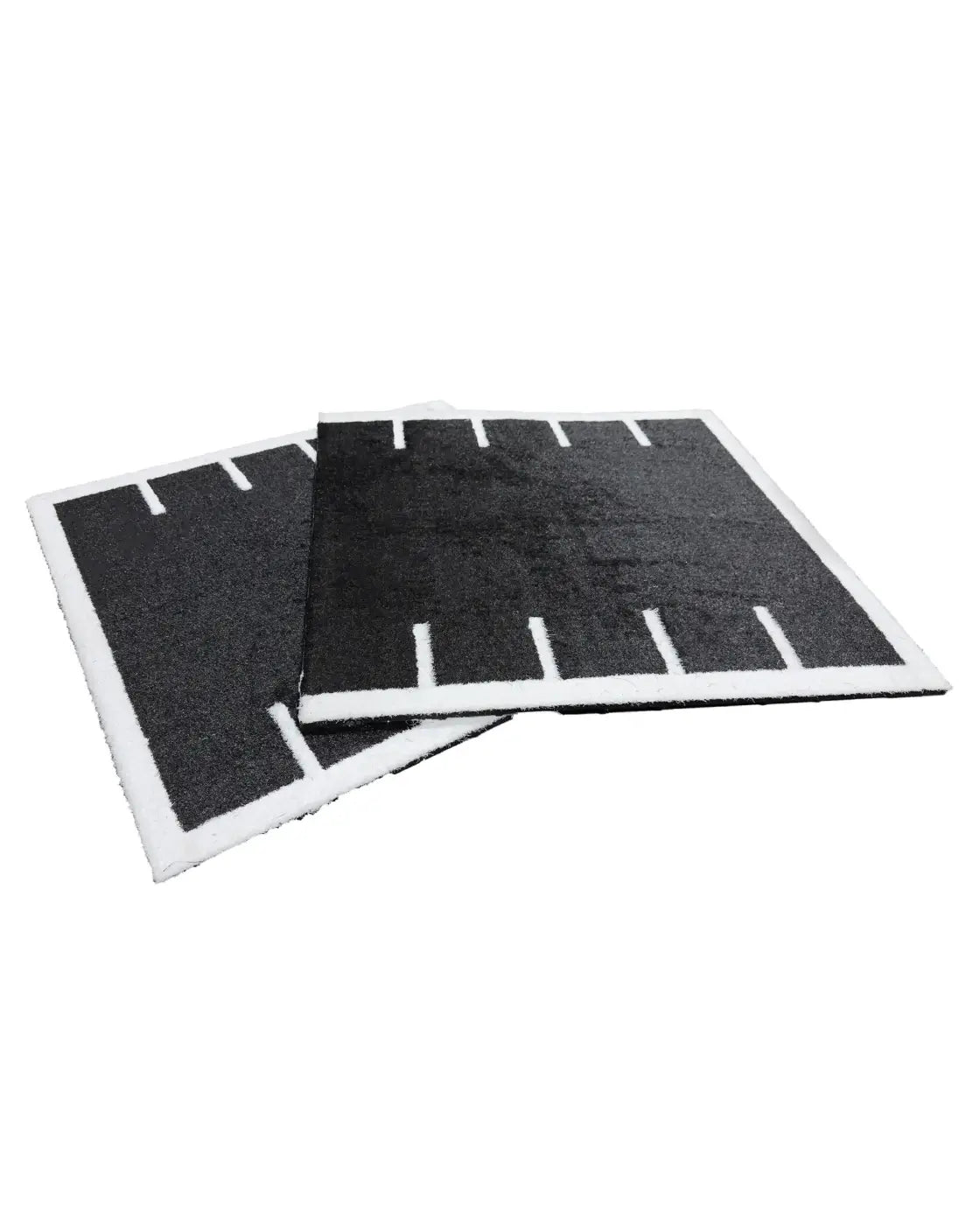 Black rectangular air filter pads with white foam borders and vertical slits for 30mm premium sled track turf tile 1x1m