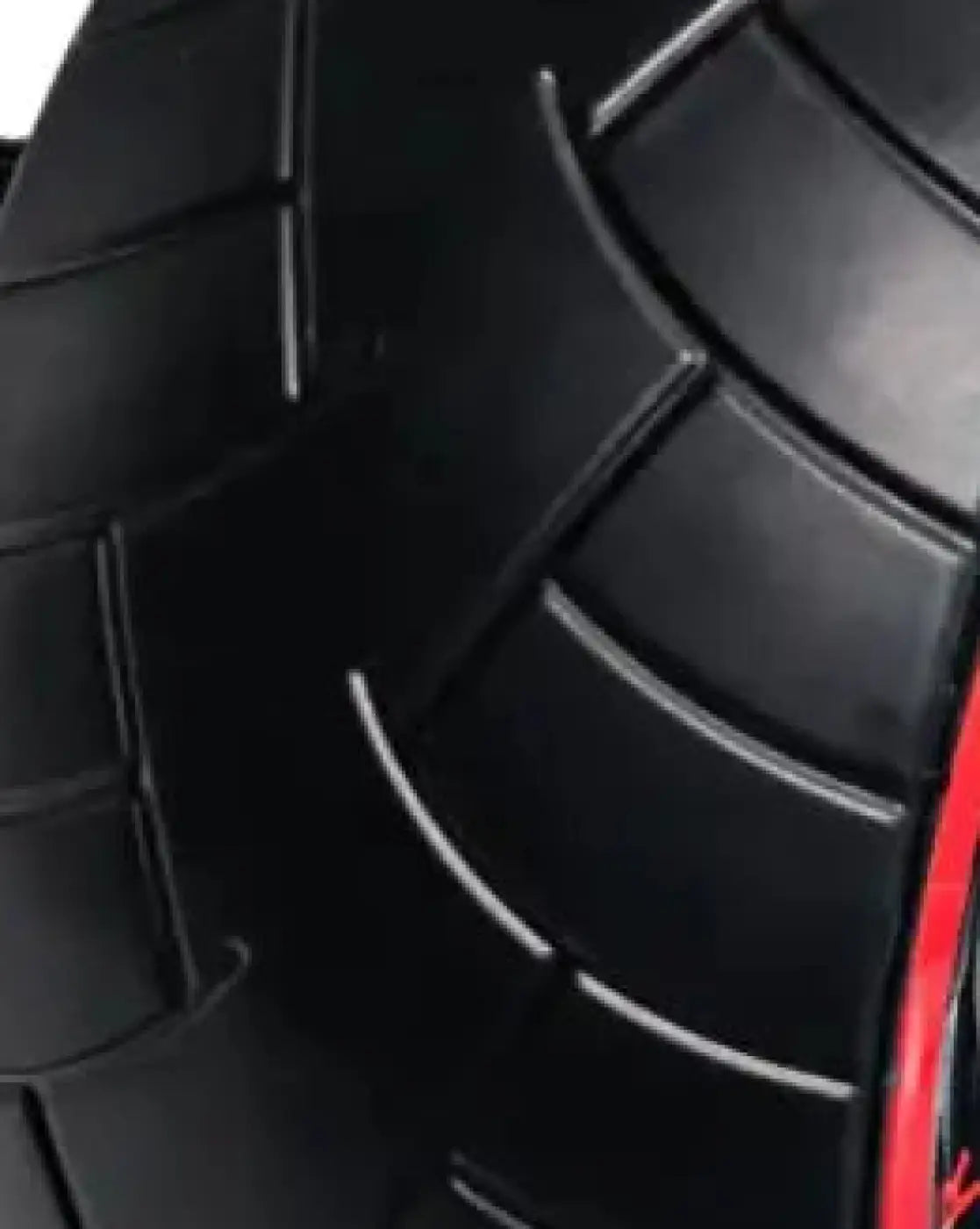 Ab wheel pro featuring a black rubber tire with deep treads and red sidewall accent for home gyms