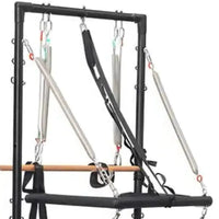 Black metal aluminium reformer with tower system half trapeze featuring silver resistance bands and wooden bar for home workout