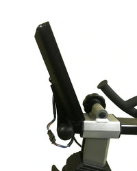Black rectangular touchscreen monitor on silver and black exercise bike console for Ascend 2.0 home training