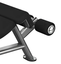 Close-up of a black padded weight bench with a silver metal frame, showing the headrest support and leg base on a white background.