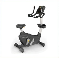 Black and silver encore upright bike with a digital display screen designed for indoor exercise and fitness
