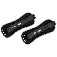 Two black ankle weight straps labeled '1KG' on a white background