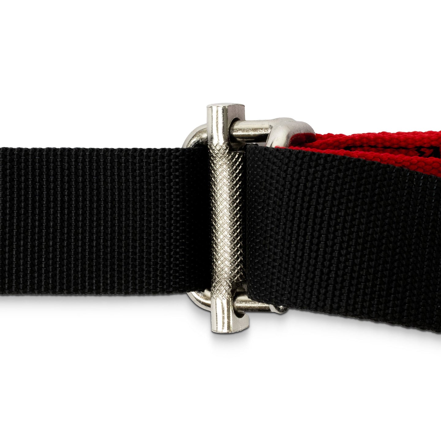 Close-up of a black webbed strap with a silver metal buckle and a red inner layer, shown on a white background.