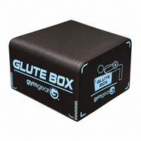 Black rectangular gym equipment box with light blue and white 'GLUTE BOX' and 'gymgear' branding, shown on a plain white background.