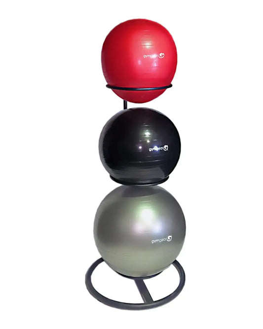 Stacked gymnast brand gym balls in red black and silver on a gym gear gym ball stand for home fitness use