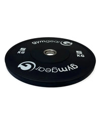 Gym Gear black 5kg bumper plate with white branding and metal hole designed for home use