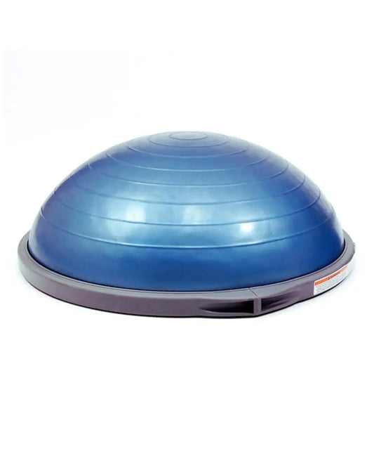 Blue plastic balance dome with gray base in the gym gear bosu balance trainer for home gym use