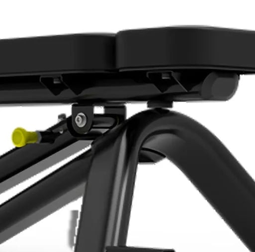 Close-up detail of a black exercise or gym piece with a curved frame, padded top surface, mounting bracket, and a small yellow adjustment knob on a white background.