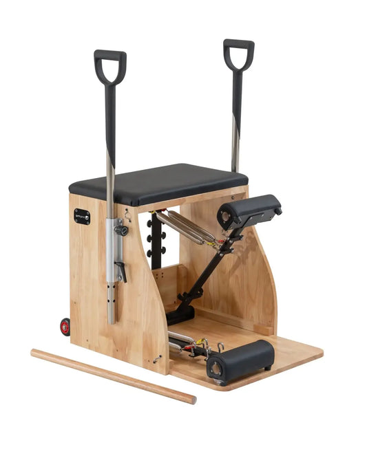 Wooden pilates reformer with black padded seat handles metal springs and rollers in gym gear combination wunda chair uk delivery