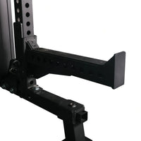 Black metal power rack safety bar with perforated design and sturdy welded joints on Gym Gear Elite Series DAP Half Rack combo