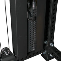 Black metal weight stack with numbered load indicators and coiled cable on gym gear elite series dap half rack combo