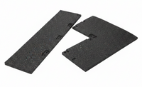 Two black textured rubber or foam panels with pre-drilled mounting holes, displayed on wooden pallets.