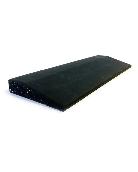 Black rubber gym floor edge with textured surface and tapered edges for home workout safety and flooring protection