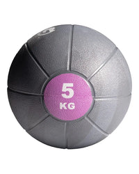 Gym gear medicine ball 5 kg gray textured surface with pink circular label designed for home workout