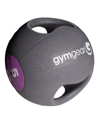 Gray gym gear medicine ball with handles featuring a purple weight label and white branding for home gym use