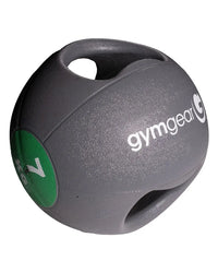 Gray gym gear medicine ball with textured surface and two handles with a green 5kg label for home gym use