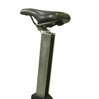 Black leather bicycle saddle mounted on a silver metallic seat post of gym gear pursuit 2.0 indoor cycling bike uk