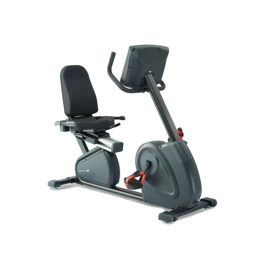 Black and gray Gym Gear R8 recumbent exercise bike with red pedal accents for indoor fitness use