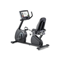 Black Gym Gear R8e recumbent exercise bike with digital display screen and padded seat for home gym use in UK