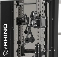 Close-up of a black and silver industrial pulley system with a visible vertical frame branded RHINO on the left side.