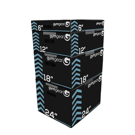 Stack of four black Gym Gear soft plyometric boxes with teal chevron patterns and size markings for home fitness