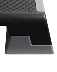 Gym Gear Studio aerobic step black and gray plastic step stool with textured scale pattern for home gym use