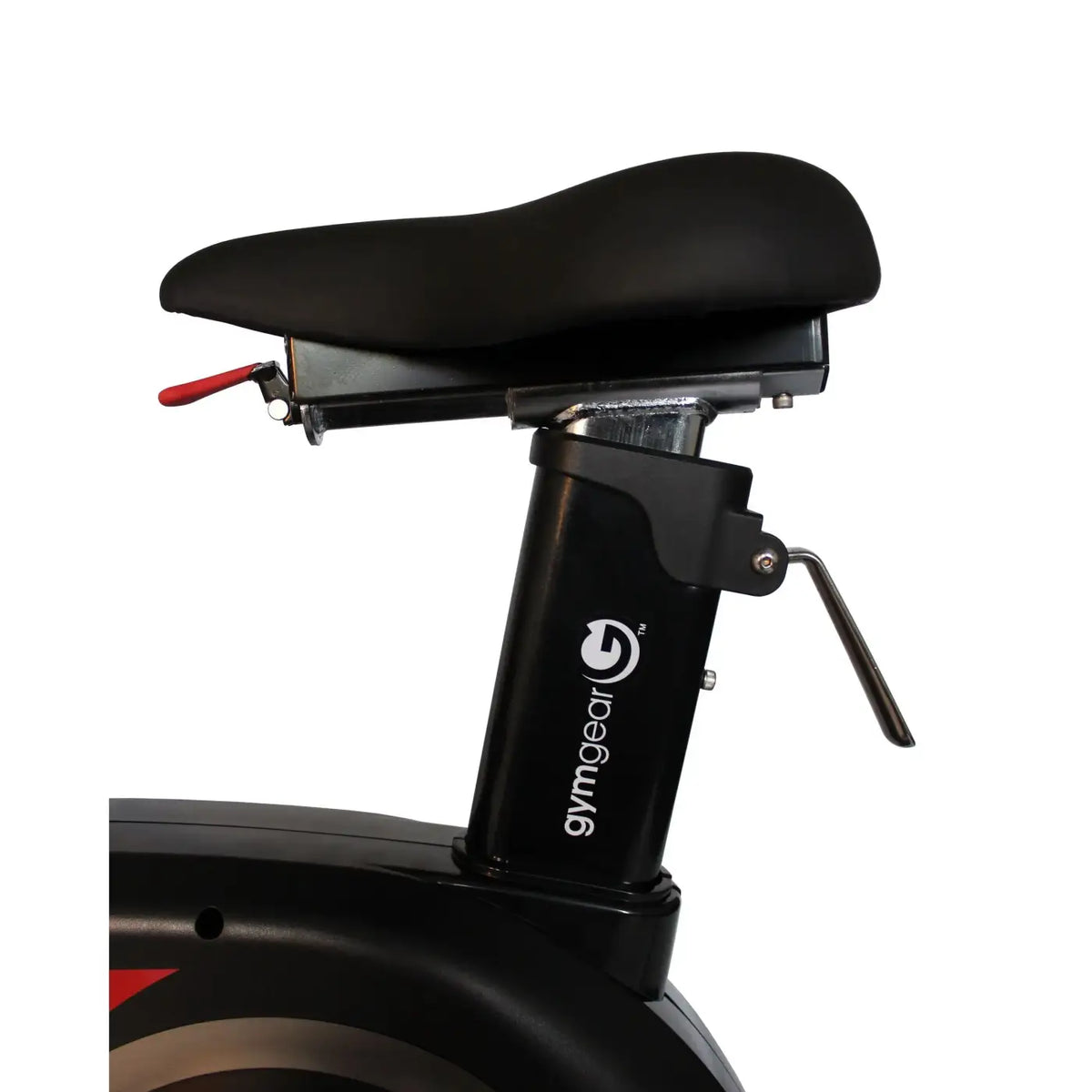 Black padded saddle with red adjustment lever on gymgear branded exercise bike seat post for gym gear tornado air assault bike