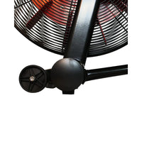 Black industrial floor fan with red interior and protective wire mesh grille for gym gear tornado air assault bike use