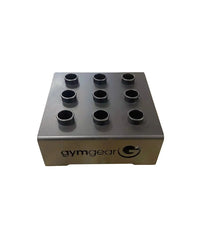 Black metal gymgear weight plate holder with nine circular slots for vertical Olympic bar storage in home fitness use