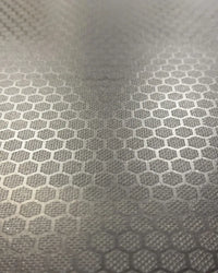 Silver metallic surface with a repeating hexagonal pattern on gym gear wooden plyometric box for home fitness use