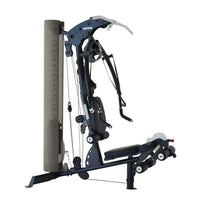 Inspire m2 multigym home gym machine in black and gray with adjustable weight stack padded seat and multiple attachments for uk delivery