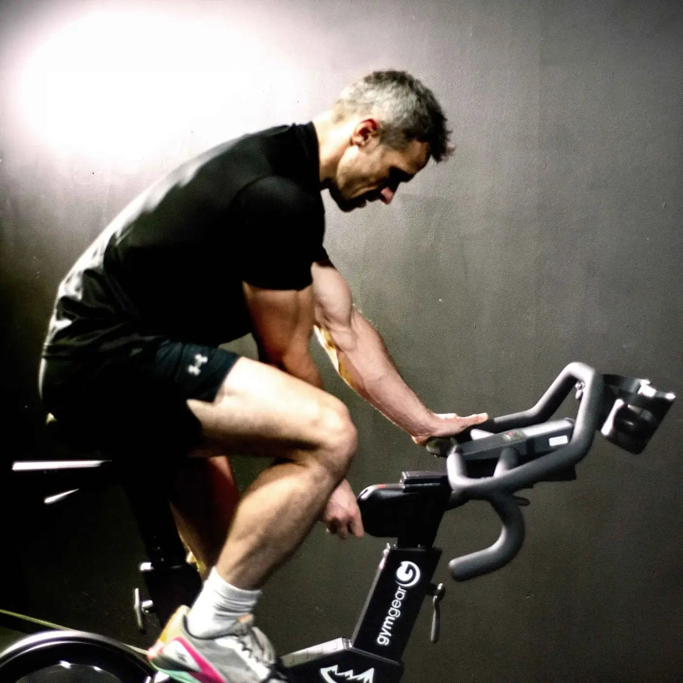 Black m sport elite upright exercise bike with sleek ergonomic handlebars and sturdy frame for home gym in uk