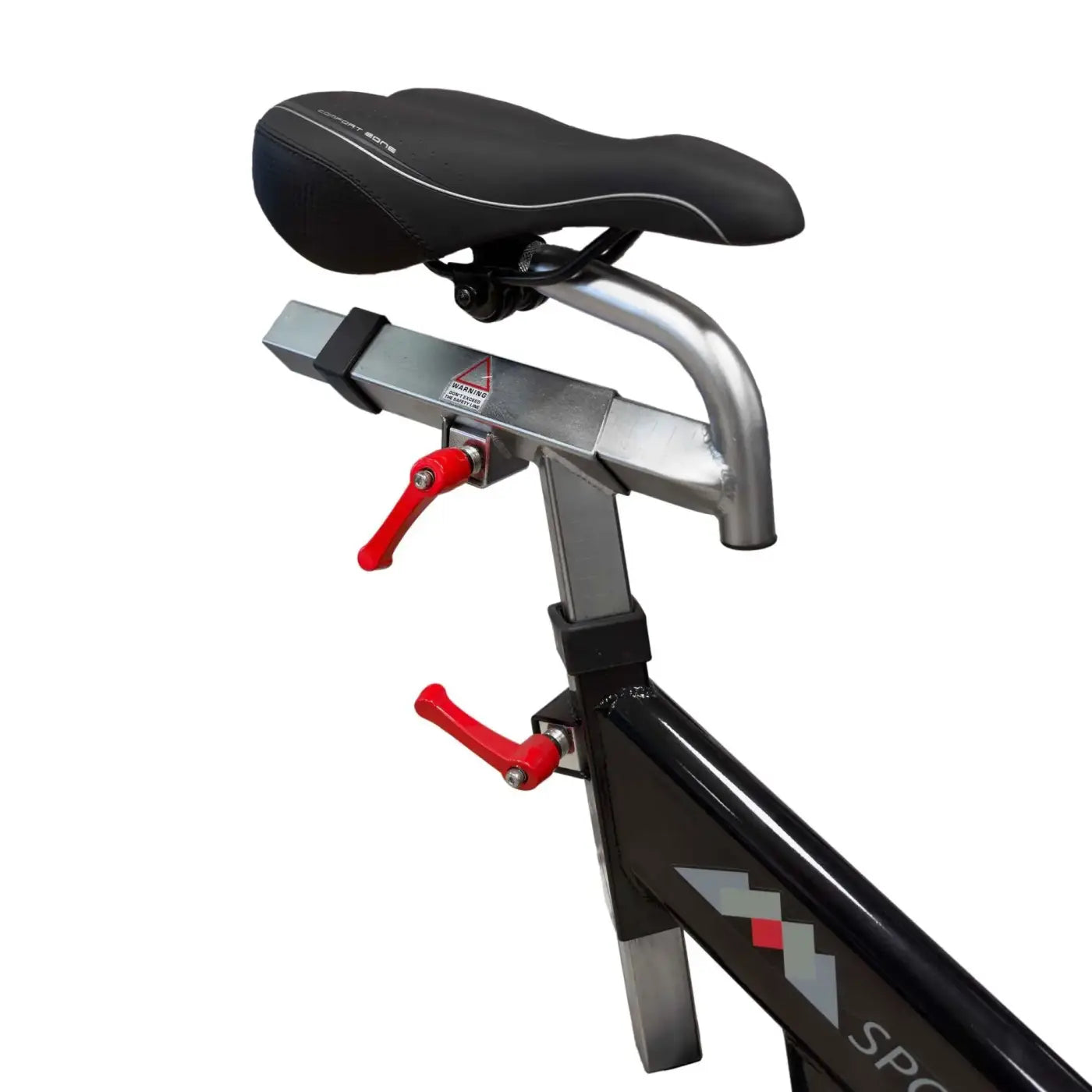 Black and silver M Sport indoor studio bike with red adjustment levers designed for home workouts