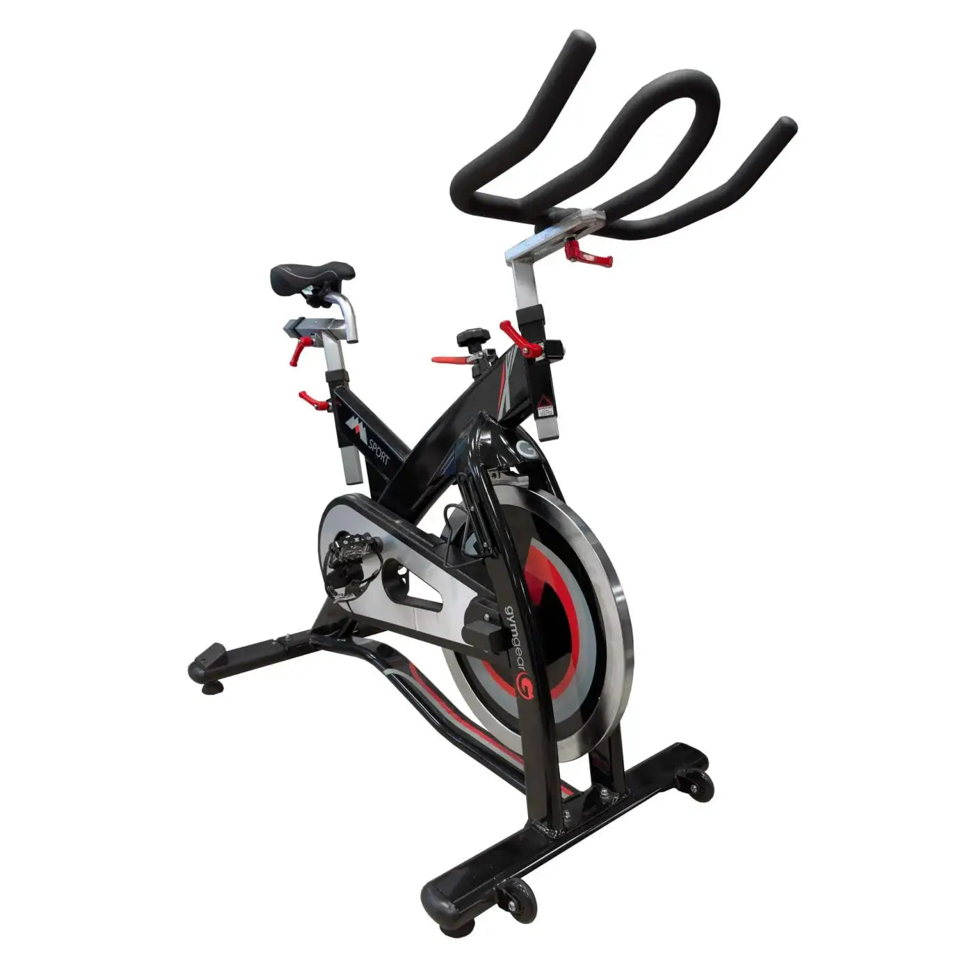 Black and red stationary indoor studio bike with sleek modern design for home workouts by M Sport Sport