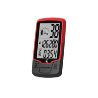 Red and black digital cycling computer on m sport pro indoor exercise bike displaying speed wattage load time and average rpm