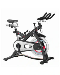 M sport spl indoor cycle stationary bike in black and silver with red and blue flywheel accents and compact design