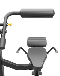 Pro Series black padded abdominal exercise machine with curved metal frame and yellow adjustment knob for home workouts
