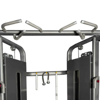 Silver metallic pro series dual adjustable pulley with four curved handles and black cable attachments for home fitness