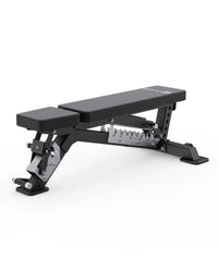 A black adjustable weight bench with a silver metal safety latch and measurement markings, shown on a clean white background.