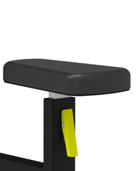 Pro Series lateral raise bench with black padded seat and bright yellow adjustment lever on black metal frame for home fitness