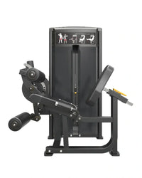 Black metal pro series leg extension leg curl machine with yellow handle accents and weight plates for home fitness