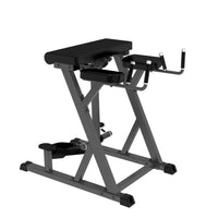 Black padded incline press machine with adjustable metal frame and handle grips from pro series plate loaded reverse hyperextension