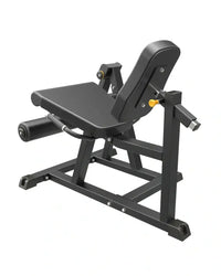 Pro Series plate loaded black metal leg curl machine with padded seat and backrest and yellow adjustment knobs for UK delivery
