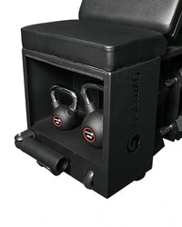 Black leatherette pro series studio hiit gym bench with integrated storage holding two black kettlebells uk delivery