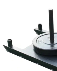 Black prowler sled with central bar weight plate and two side pegs mounted on a matching black metal base uk delivery